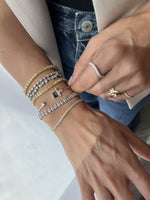 Load image into Gallery viewer, Diamond Emerald Bezel Setting Diamond Tennis Bracelet 0.3ct Each - HIBA JABER