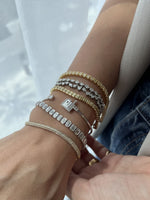Load image into Gallery viewer, Diamond Emerald Bezel Setting Diamond Tennis Bracelet 0.3ct Each - HIBA JABER