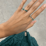 Load image into Gallery viewer, Emerald Eternity Ring With an Odd Diamond - HIBA JABER
