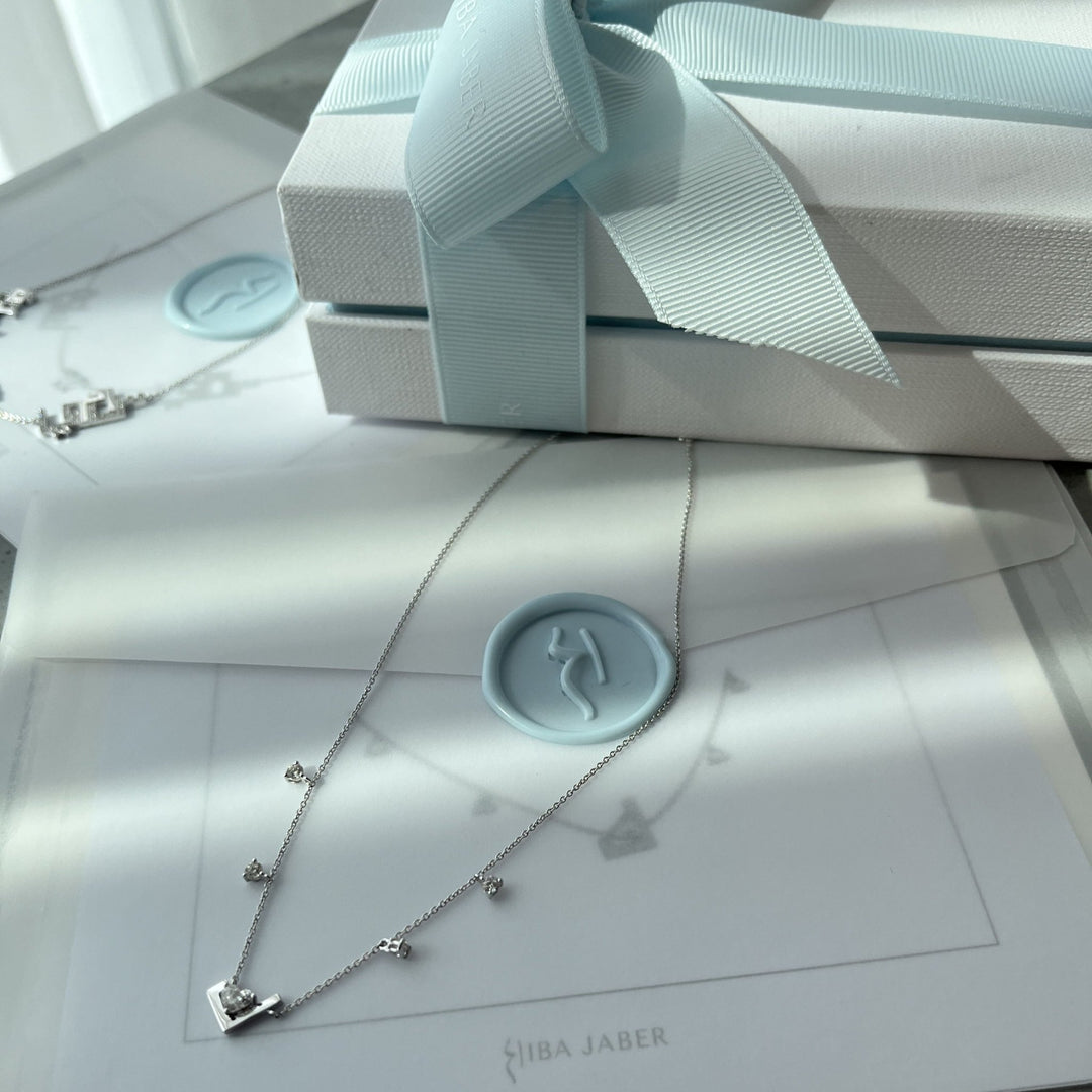 Initial Hanging Droplet with Heart Diamond - HIBA JABER